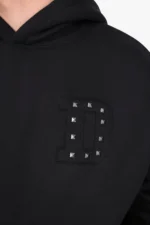 DROPSIZE Oversized Hoodie mit Nietenaufnäher